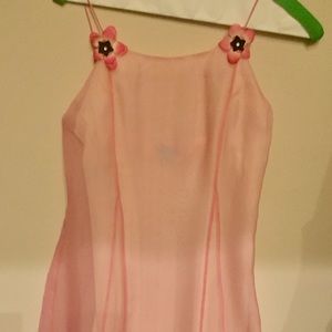 Stunning pink dress with sheer pink overlay.